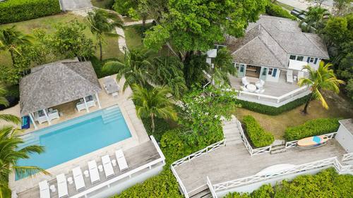 Aerial view of the pool and cottage grounds