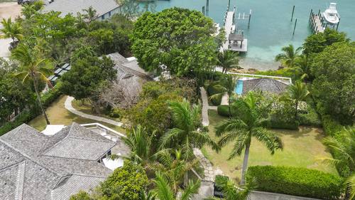 Aerial view of the cottage rooftops and palms