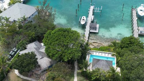 Aerial view of the dock, boats, and shoreline